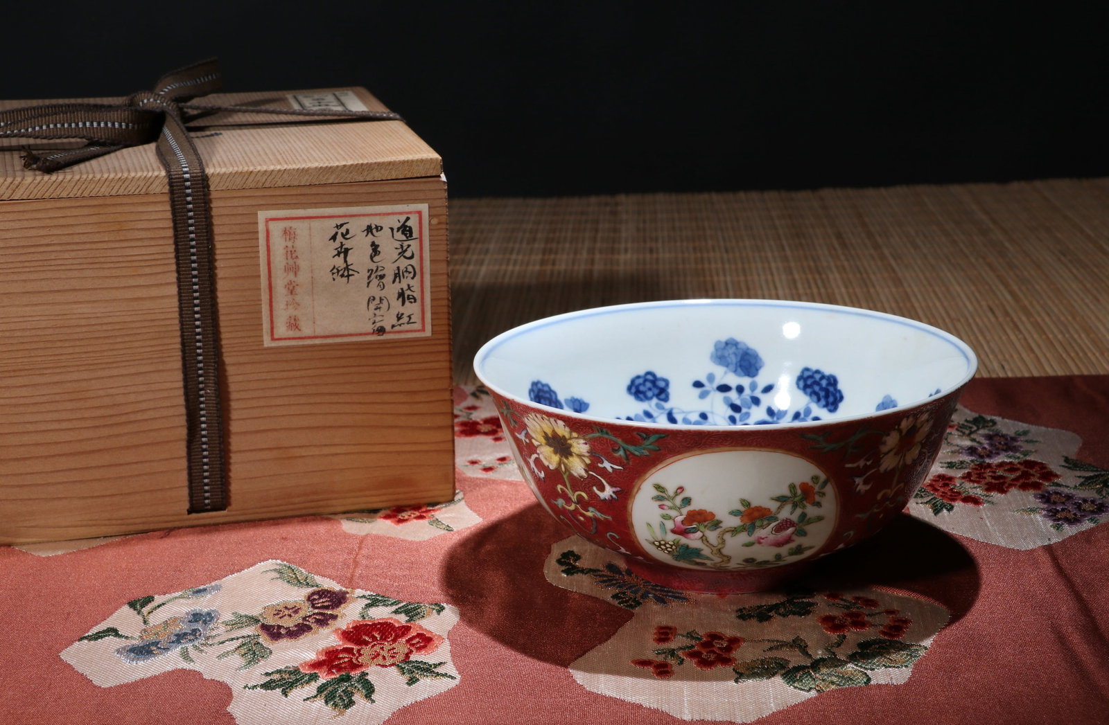 A RUBY RED-GROUND MEDALLION 'FLOWERS' BOWL