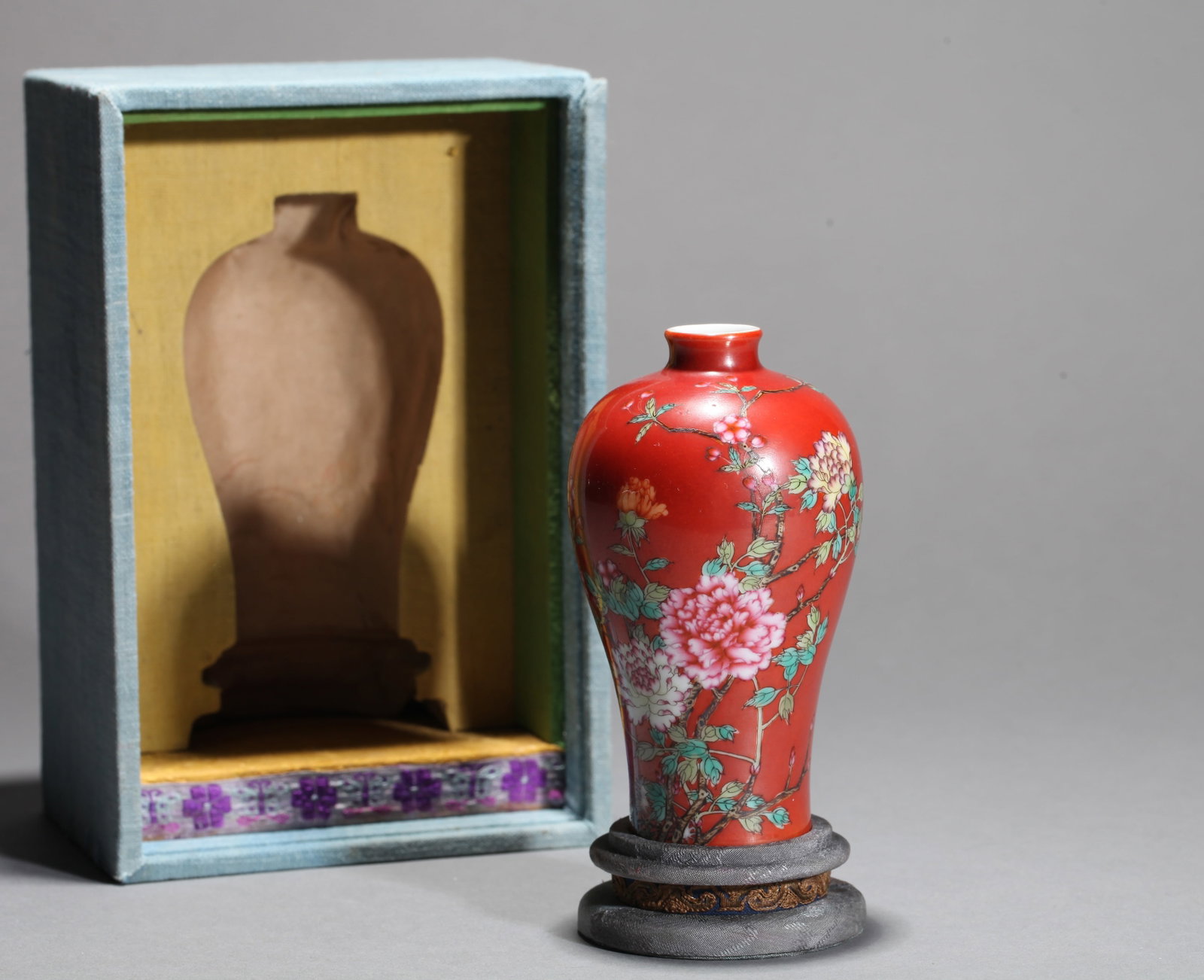 A RUBY RED-GLAZED 'FLOWERS' MEIPING: A RUBY RED-GLAZED 'FLOWERS' MEIPING Dimensions: Height: 12 cm (4.72 in.). All measurements are approximate.