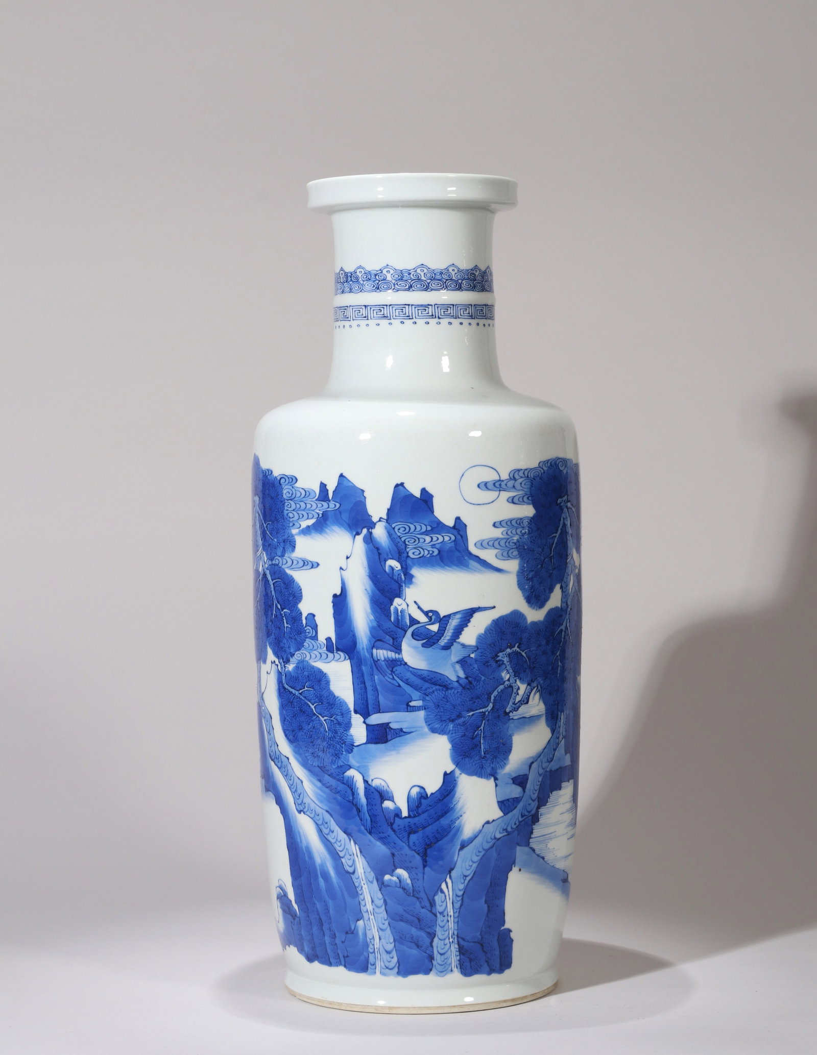 A BLUE AND WHITE 'DEER AND CRANE' BEATER VASE