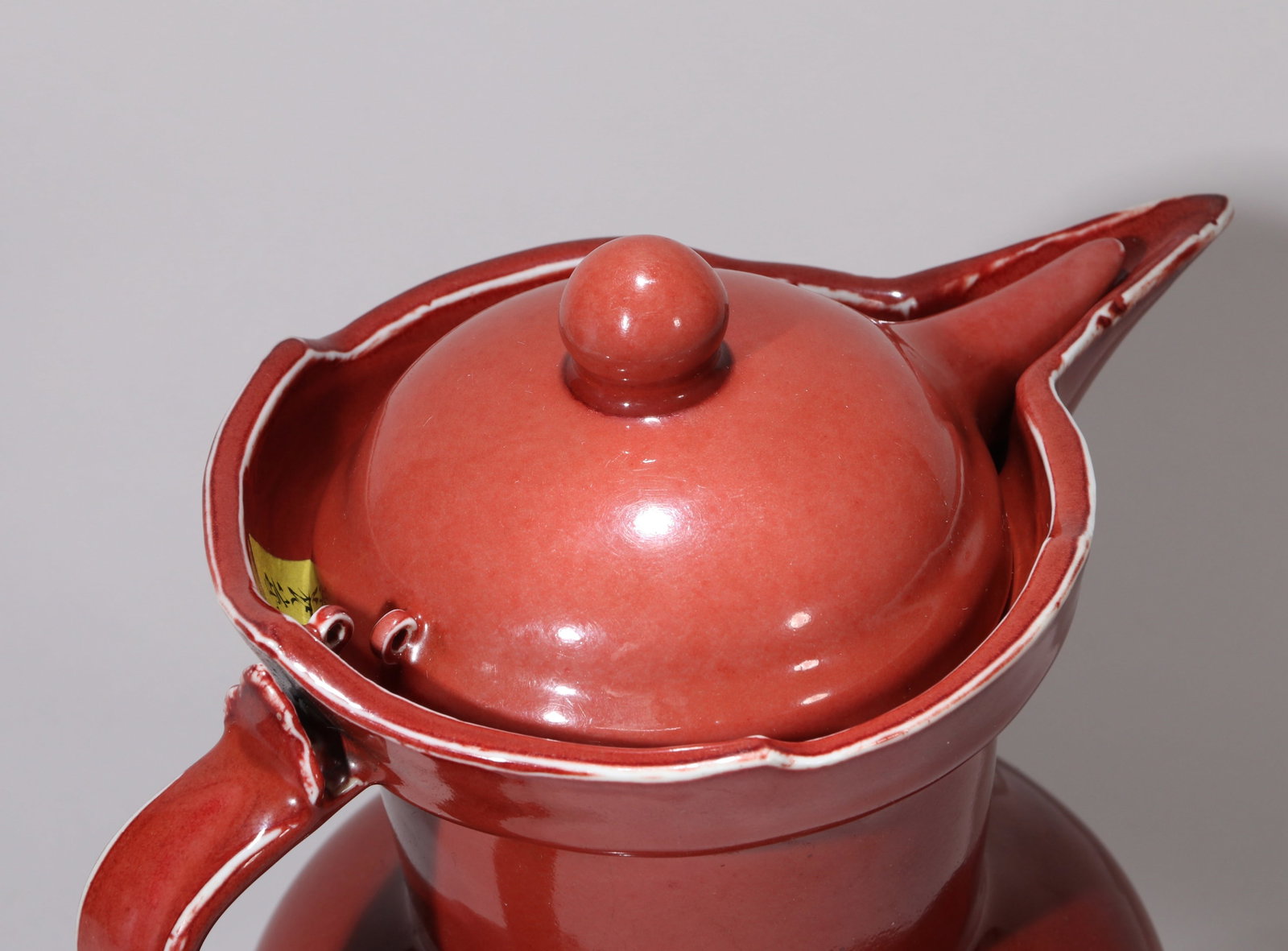 A RUBY RED-GLAZED 'PLAIN' MONK'S-CAP EWER - 2