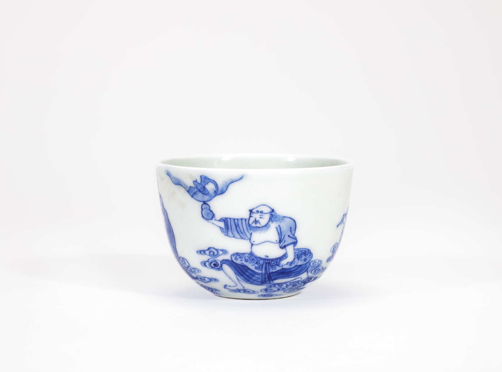 A BLUE AND WHITE 'EIGHT IMMORTALS' STEM CUP