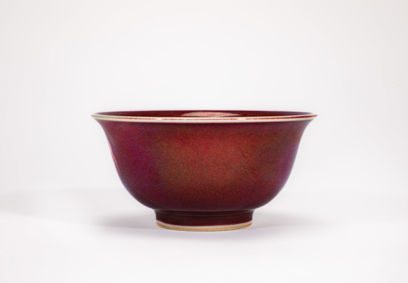 A RED-GLAZED 'PLAIN' CUP (1 of 5)