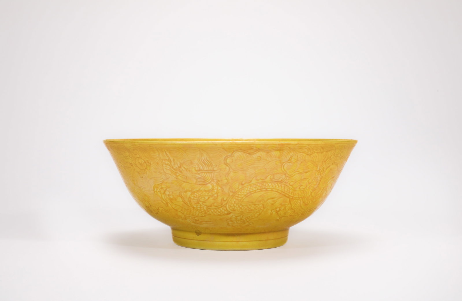 A YELLOW-GLAZED 'WAVES AND DRAGON' BOWL (1 of 8)