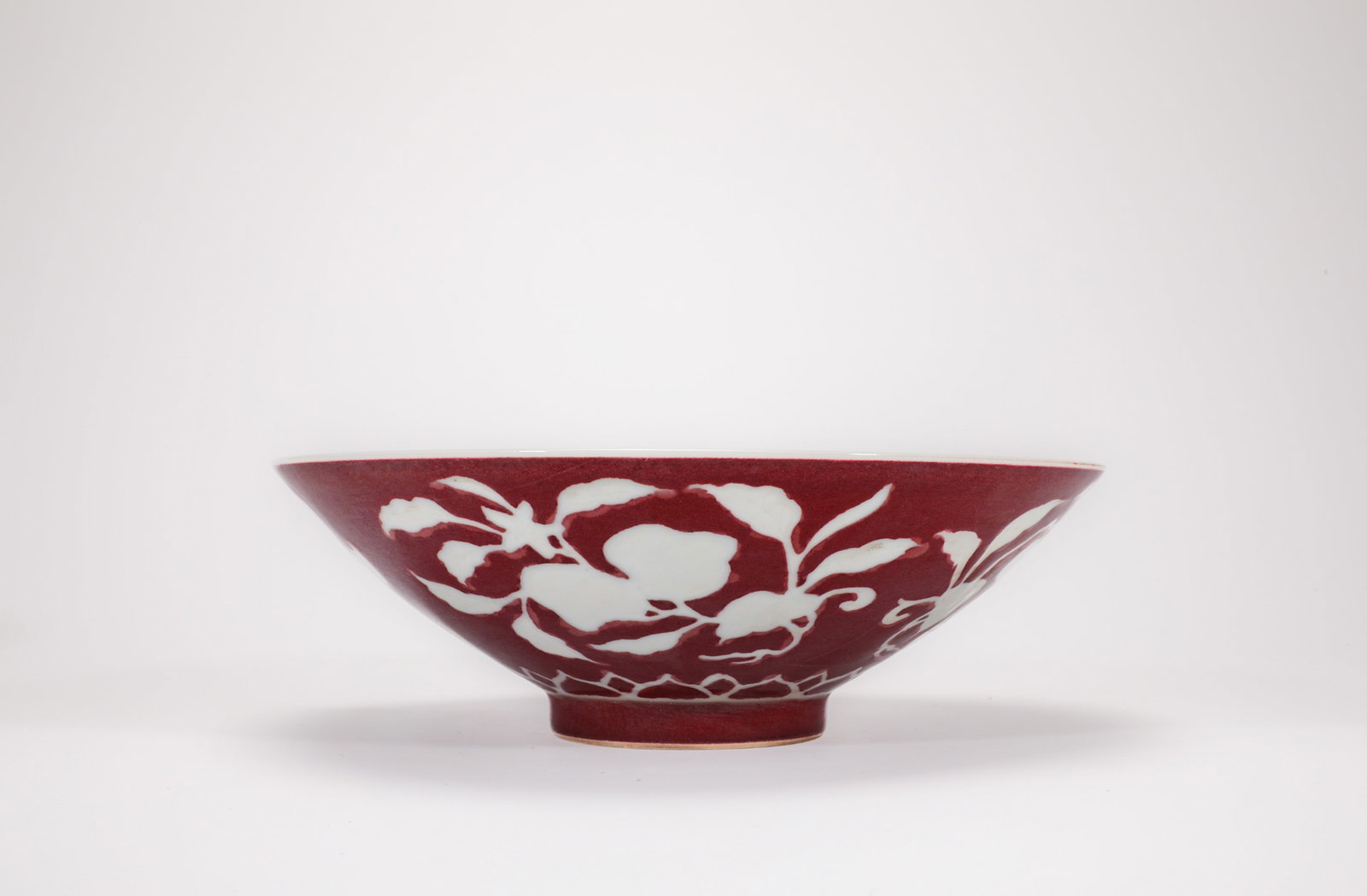 A RED-GLAZED 'FLOWERS AND FRUIT, RESERVE' BOWL (1 of 8)