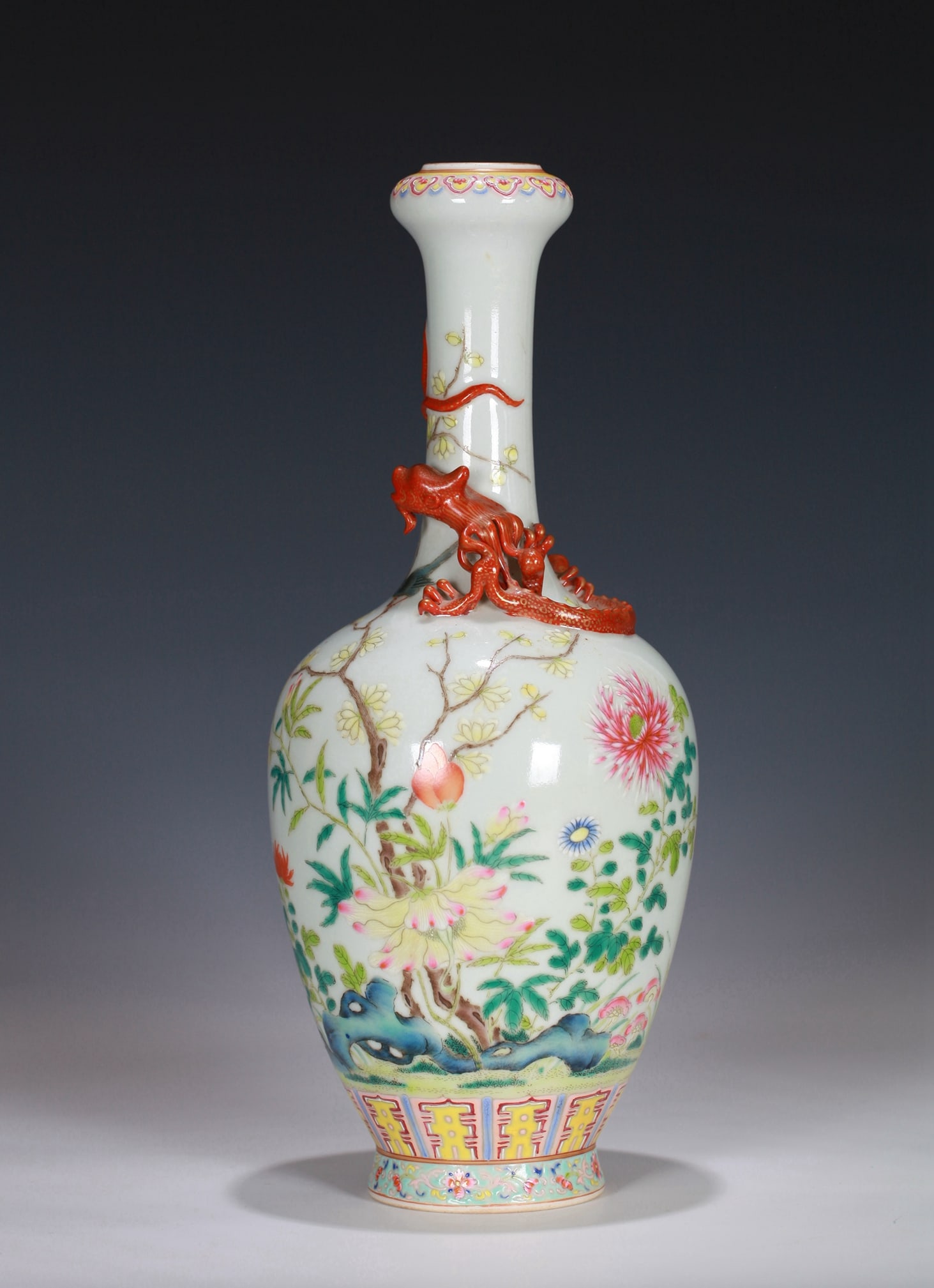 A FAMILLE ROSE CARVED 'DRAGON' WASHER-MOUTH VASE