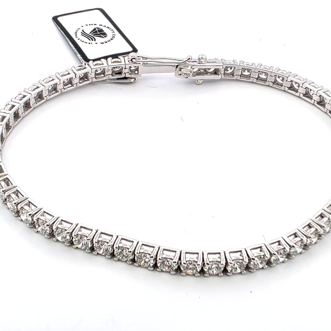 TENNIS BRACELET IN 18KT WHITE GOLD WITH HIGH QUALITY DIAMONDS: TENNIS BRACELET IN 18KT WHITE GOLD WITH HIGH QUALITY DIAMONDS Description: Tennis Bracelet in 18kt white gold with high quality diamonds Weight Gr 14,79 Brilliant-cut diamonds Ct 6.70 about G/H SI1/SI