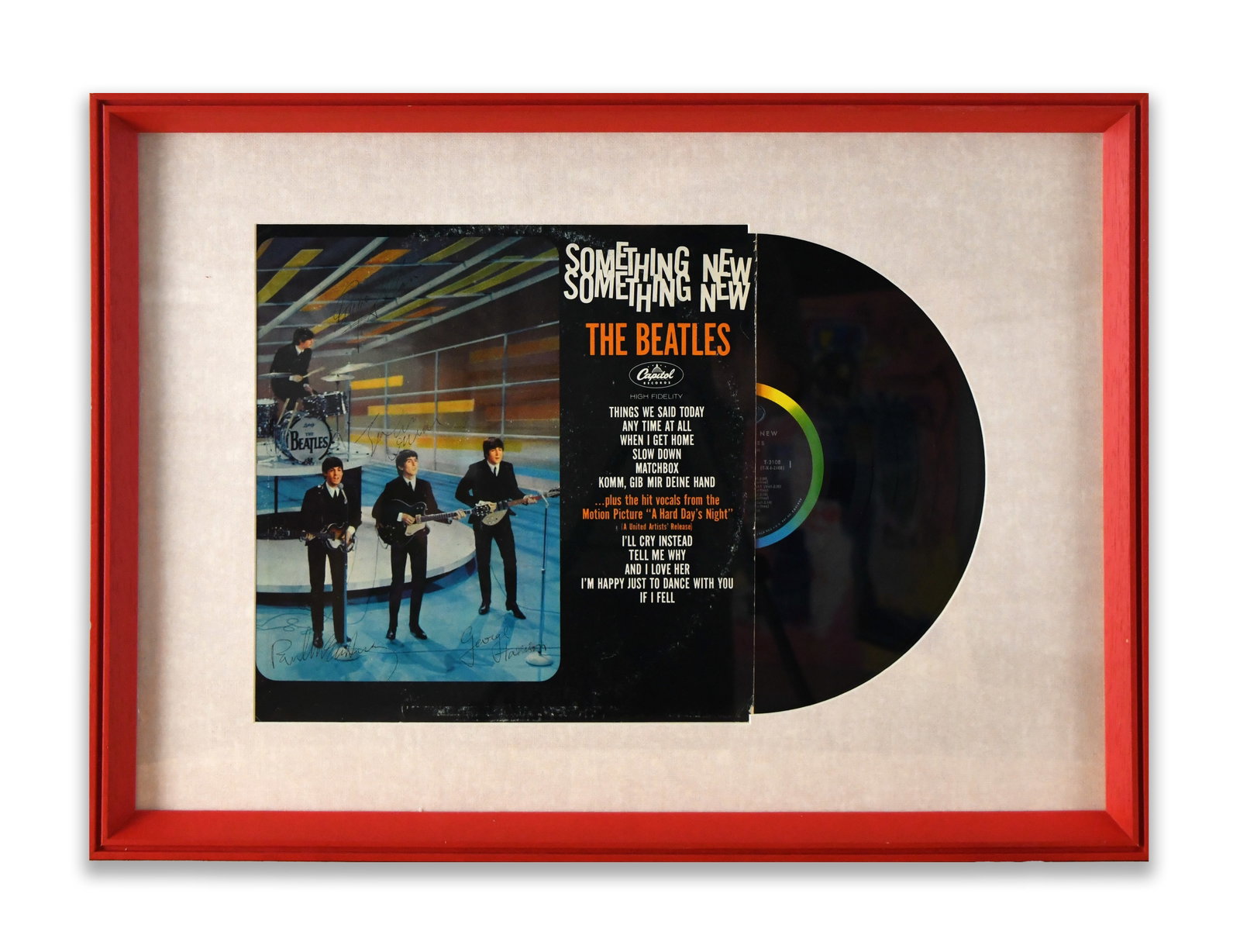 THE BEATLES - SOMETHING NEW CAPITOL RECORDS VINYL ALBUM FRAMED DISPLAY: THE BEATLES - SOMETHING NEW CAPITOL RECORDS VINYL ALBUM FRAMED DISPLAY Signature: John Lennon, Paul McCartney, George Harrison, Ringo Starr Description: The presentation features the original Somethin