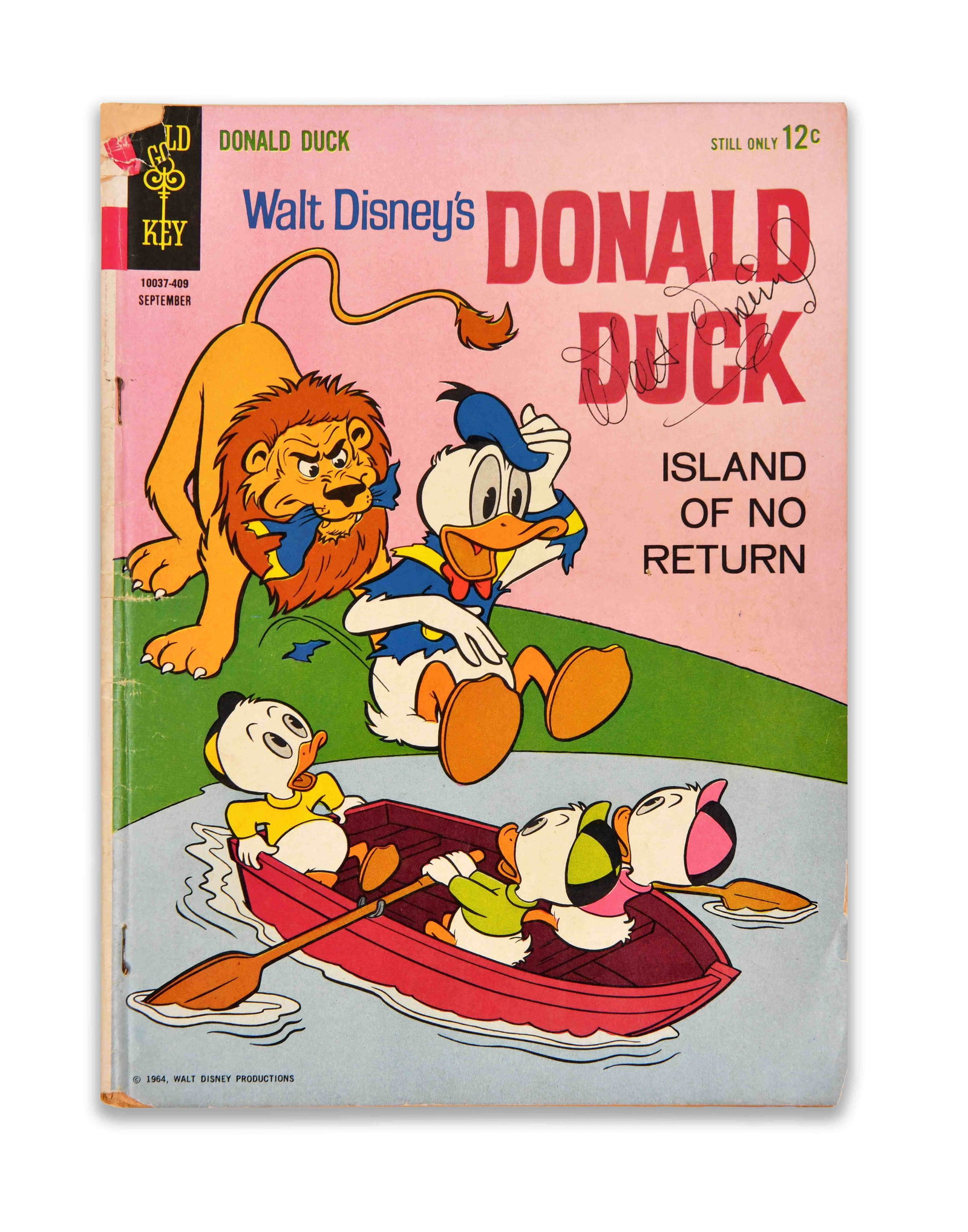 WALT DISNEY (1901-1966), DONALD DUCK: ISLAND OF NO RETURN, SIGNED COMIC BOOK: WALT DISNEY (1901-1966), DONALD DUCK: ISLAND OF NO RETURN, SIGNED COMIC BOOK Signature: A handwritten signature reading "Walt Disney" is visible on the cover; authentication status not confirmed. Desc