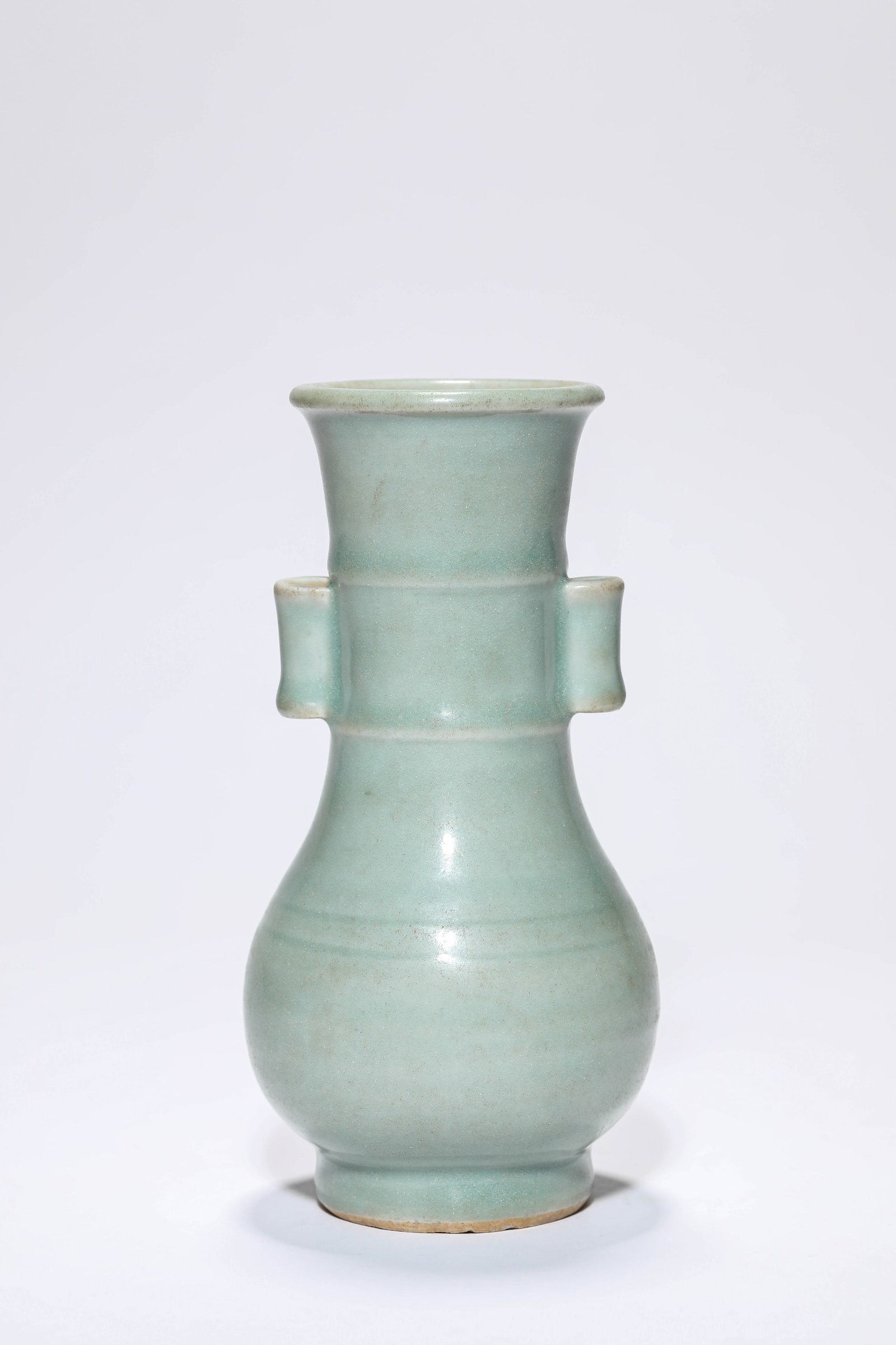 A CELADON 'PLAIN' VASE (1 of 5)