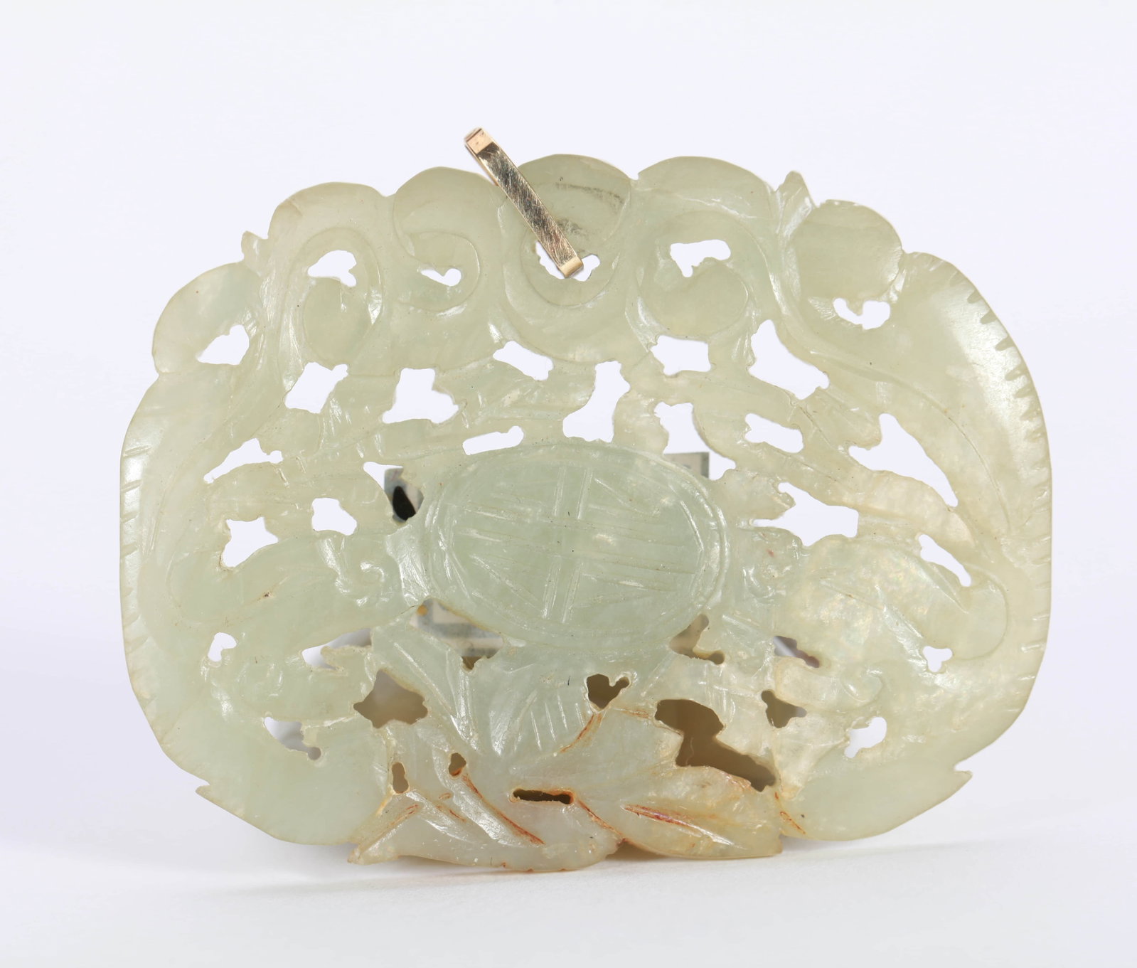 A JADE OBJECT: A JADE OBJECT Dimensions: Length: 7 cm (2.76 in.). All measurements are approximate.