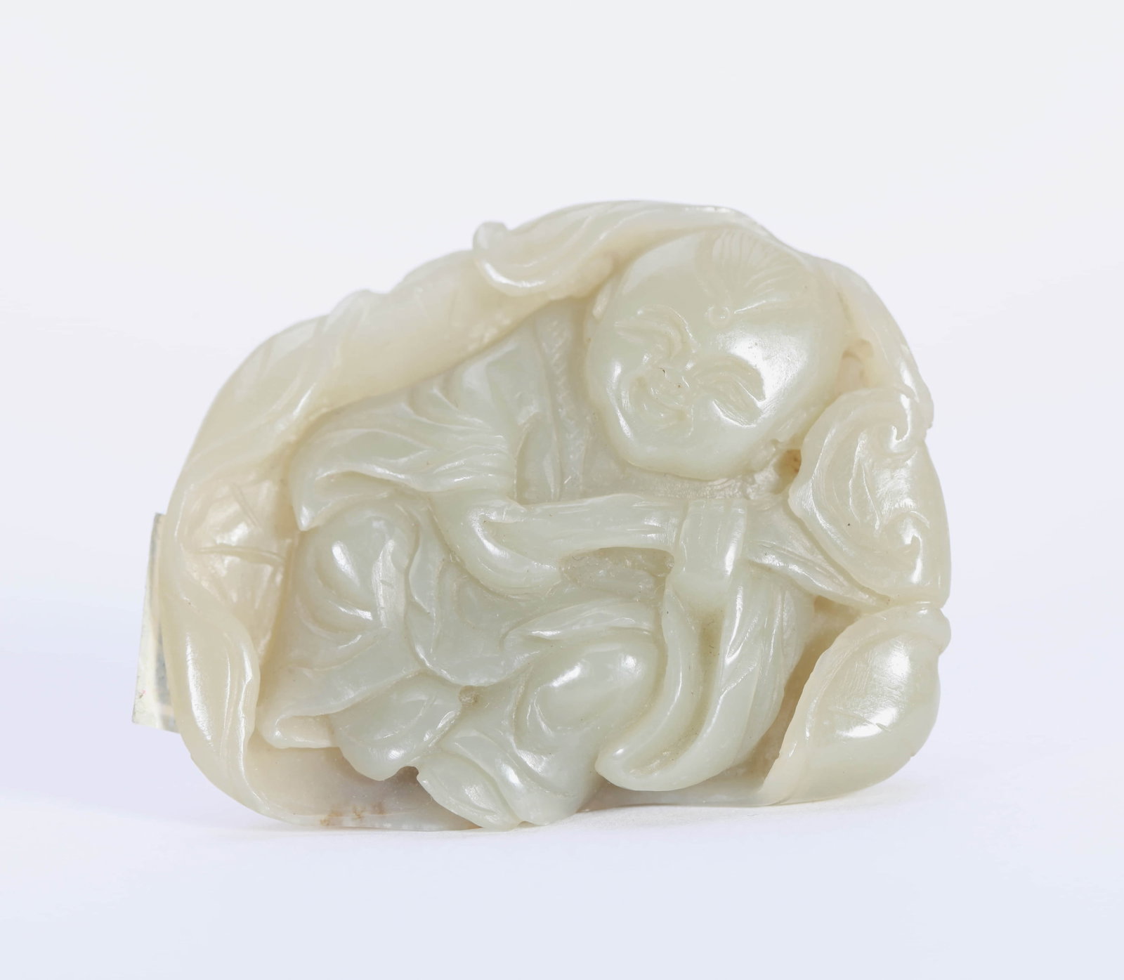 A JADE OBJECT: A JADE OBJECT Dimensions: Length: 6 cm (2.36 in.). All measurements are approximate.
