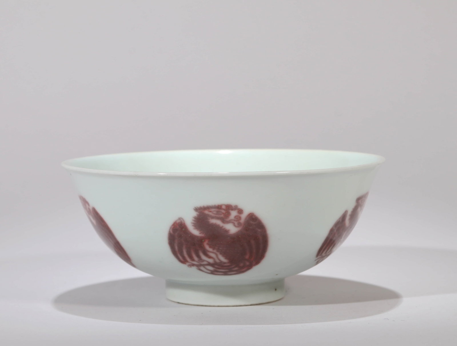 A COPPER-RED 'ROUNDEL CRANE' BOWL: A COPPER-RED 'ROUNDEL CRANE' BOWL Dimensions: Diameter: 15.5 cm (6.10 in.). All measurements are approximate.