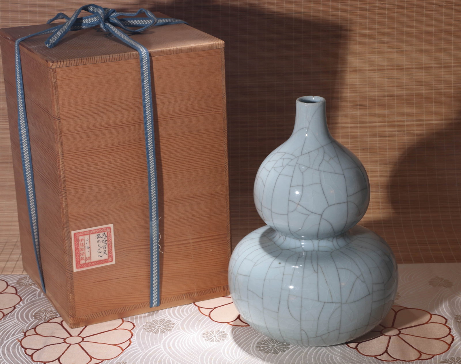 A GE-TYPE GLAZED 'PLAIN' GOURD VASE: A GE-TYPE GLAZED 'PLAIN' GOURD VASE Dimensions: Height: 33 cm (12.99 in.). All measurements are approximate.