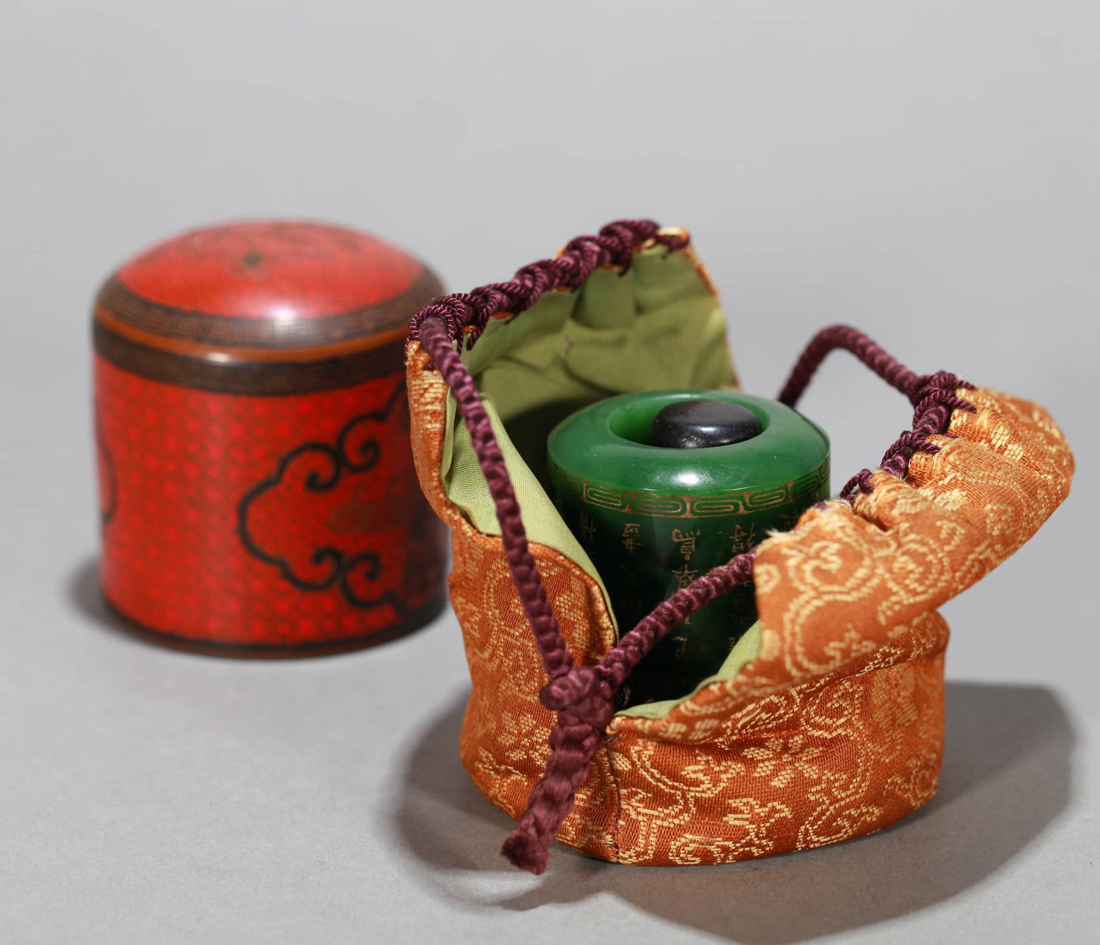 A SPINACH JADE 'IMPERIAL POEM' ARCHER'S RING (1 of 12)
