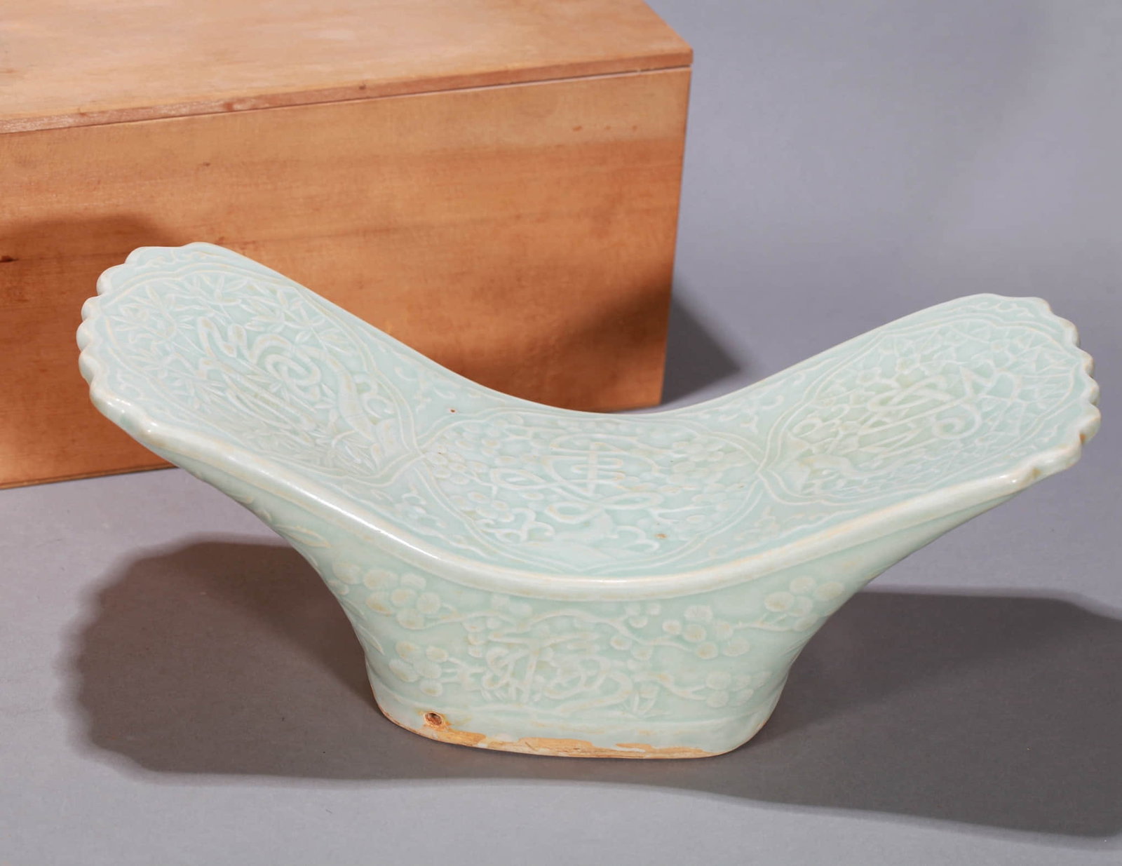 A QINGBAI GLAZED 'FLOWERS' PILLOW (1 of 10)