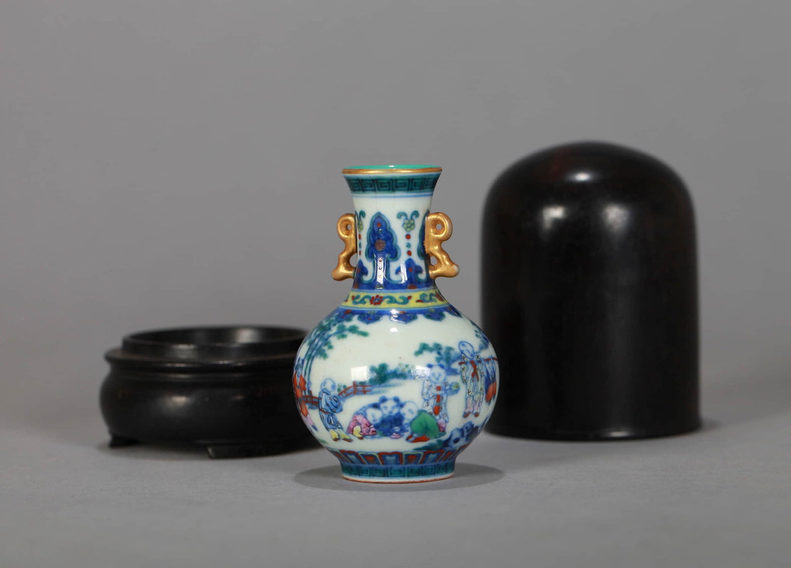 A DOUCAI 'FIGURES AND STORY' SMALL VASE: A DOUCAI 'FIGURES AND STORY' SMALL VASE Dimensions: Height: 8.2 cm (3.23 in.). All measurements are approximate.