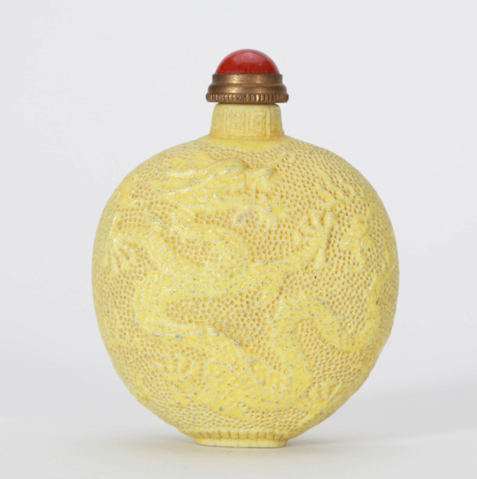 A CARVED PORCELAIN 'DRAGON' SNUFF BOTTLE (1 of 5)