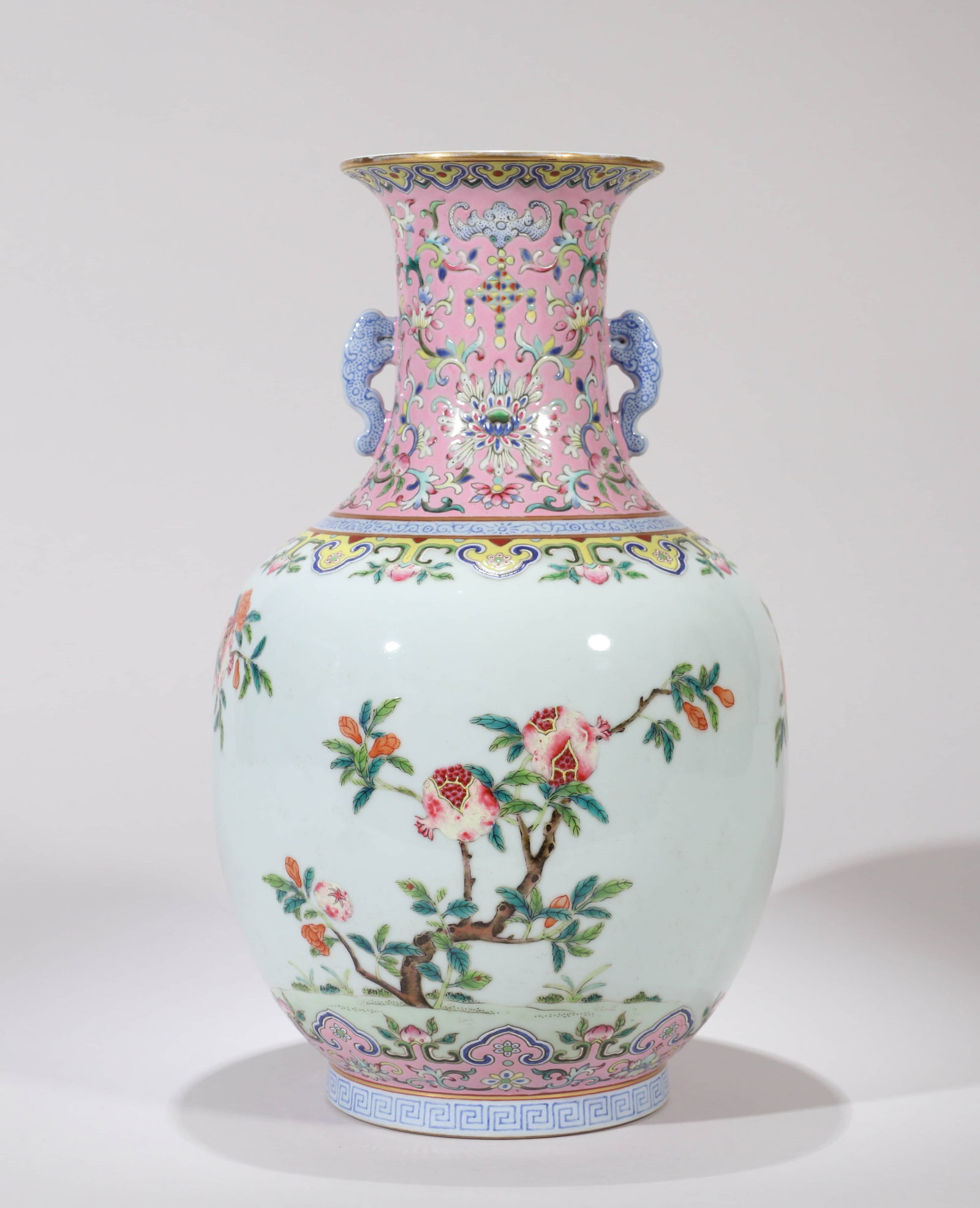 A FAMILLE ROSE 'FLOWERS' DOUBLE-HANDLE VASE: A FAMILLE ROSE 'FLOWERS' DOUBLE-HANDLE VASE Dimensions: Height: 30 cm (11.81 in.). All measurements are approximate.