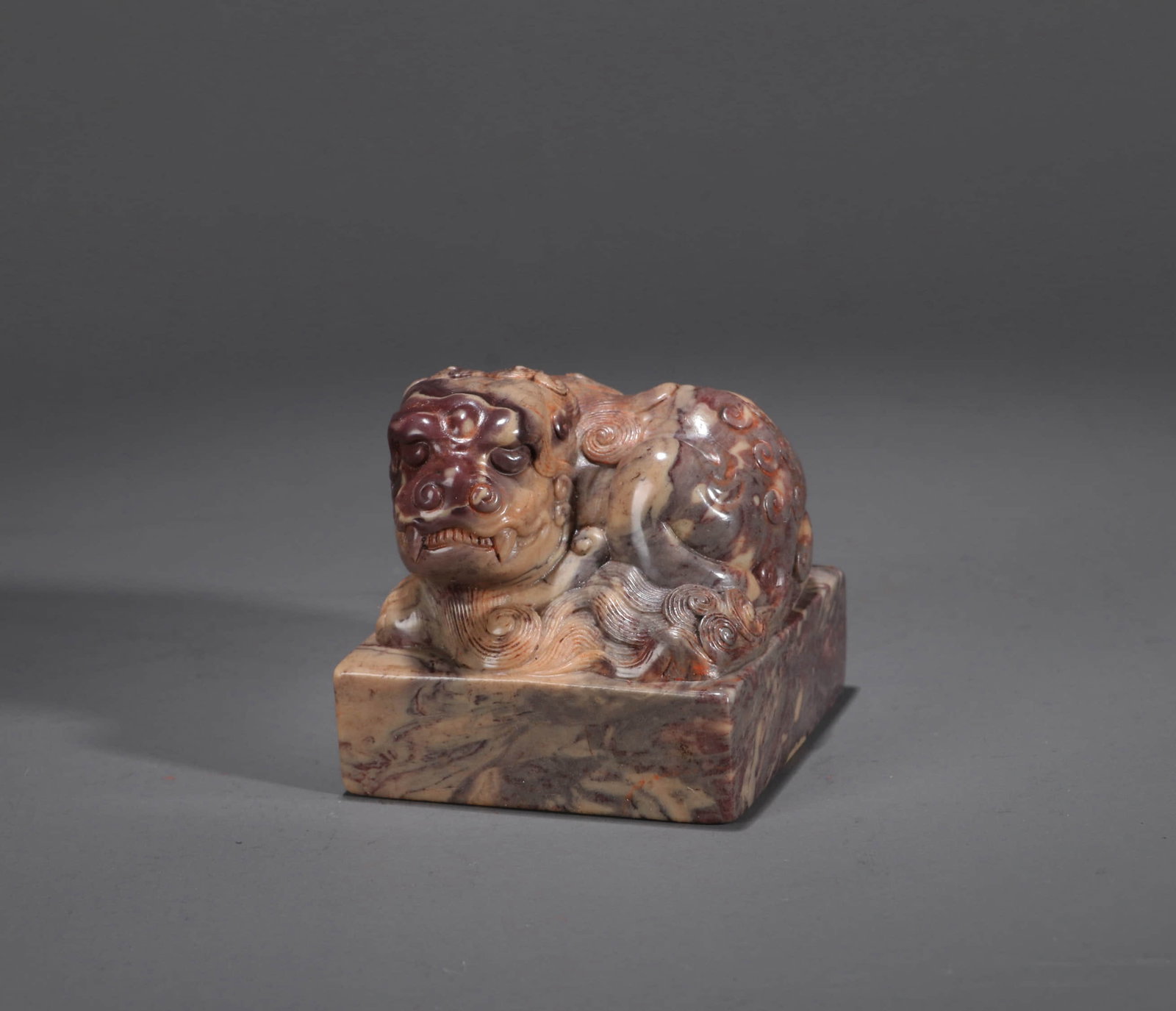 A SHOUSHAN STONE 'RECUMBENT LION-FINIAL' SEAL (1 of 6)