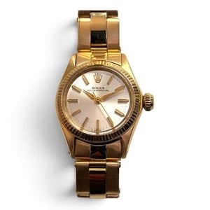 VINTAGE ROLEX-STYLE GOLD-TONE OYSTER PERPETUAL WRISTWATCH: VINTAGE ROLEX-STYLE GOLD-TONE OYSTER PERPETUAL WRISTWATCH Description: A compact vintage gold-tone wristwatch bearing Rolex and Oyster Perpetual dial markings, with a light champagne or silvered dial,
