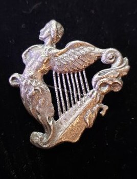 Sterling Silver Harp Angel Brooch J.M.Co Ireland: Beautiful Harp / Angel Sterling Silver brooch was made in Ireland by J.M.Co. Measures approx 1.5" by 1.5" weighs 15grams. Buyers Premium 20% *Available for In-House Shipping WE WILL BE ADDING ITEMS TO