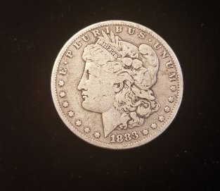 1883 Morgan Silver Dollar: 1883 Morgan Silver Dollar. See photos for details. Buyers Premium 20%. *In-House Shipping Available