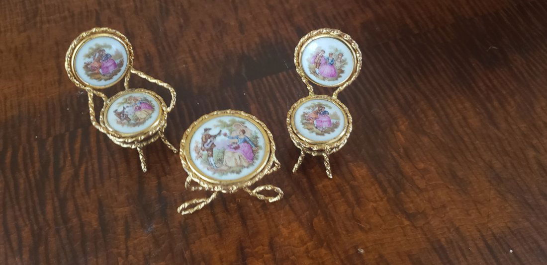 Limoges Doll House Furniture Table Chairs France: Limoges Doll House Gilt Metal Porcelain Furniture Table and Chairs. The Table stands 2" tall and the Chairs are each 2.75" tall. Buyers Premium 20%. *In-House Shipping Available.