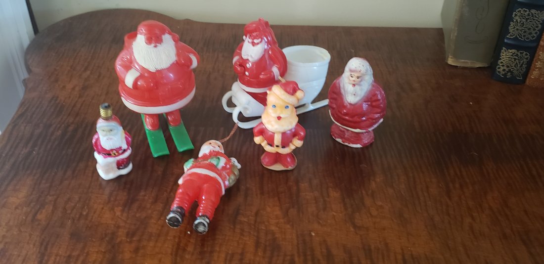 Vintage Christmas Santa Candy Containers Figural Bulb +: Vintage Christmas 3 Hard Plastic Santa Candy Containers Figural Bulb (untested) Gurley Candle Cardboard/paper candy container and hard plastic ornament. Buyers Premium 20%. *Available for In-House Shi
