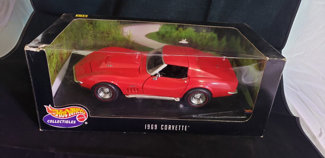 1:18 Die Cast 1969 Red Corvette Hot Wheels Collectibles: 1:18 Die Cast 1969 Red Corvette Hot Wheels Collectibles. Original Box. Buyers Premium 20%. *In-House Shipping Available**