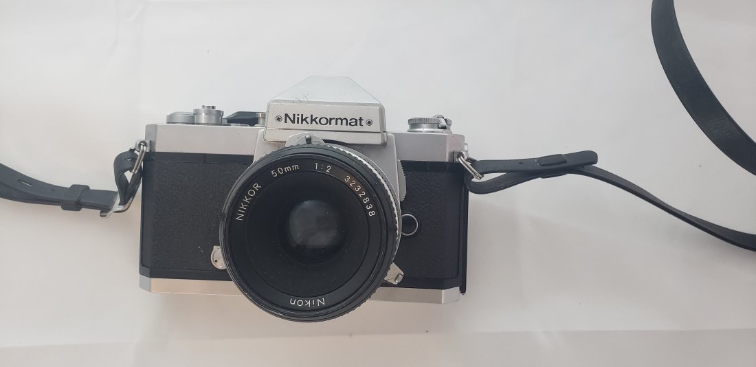 Nikkormat Camera Japan W/ Nikon Nikkor 50mm Lens: Nikkormat Camera Japan W/ Nikon Nikkor 50mm Lens. Has not been tested. Buyers Premium 20%. *In-House Shipping Available