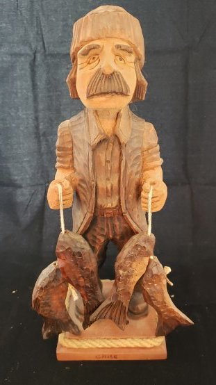 Wooden Fisherman Carving Signed J. Salazar: Wooden Fisherman Carving Signed J. Salazar stands 12.5" tall On the base in the front the word Chile is carved out and on the bottom the name J. Salazar is carved into the wood. Man with mustache hold