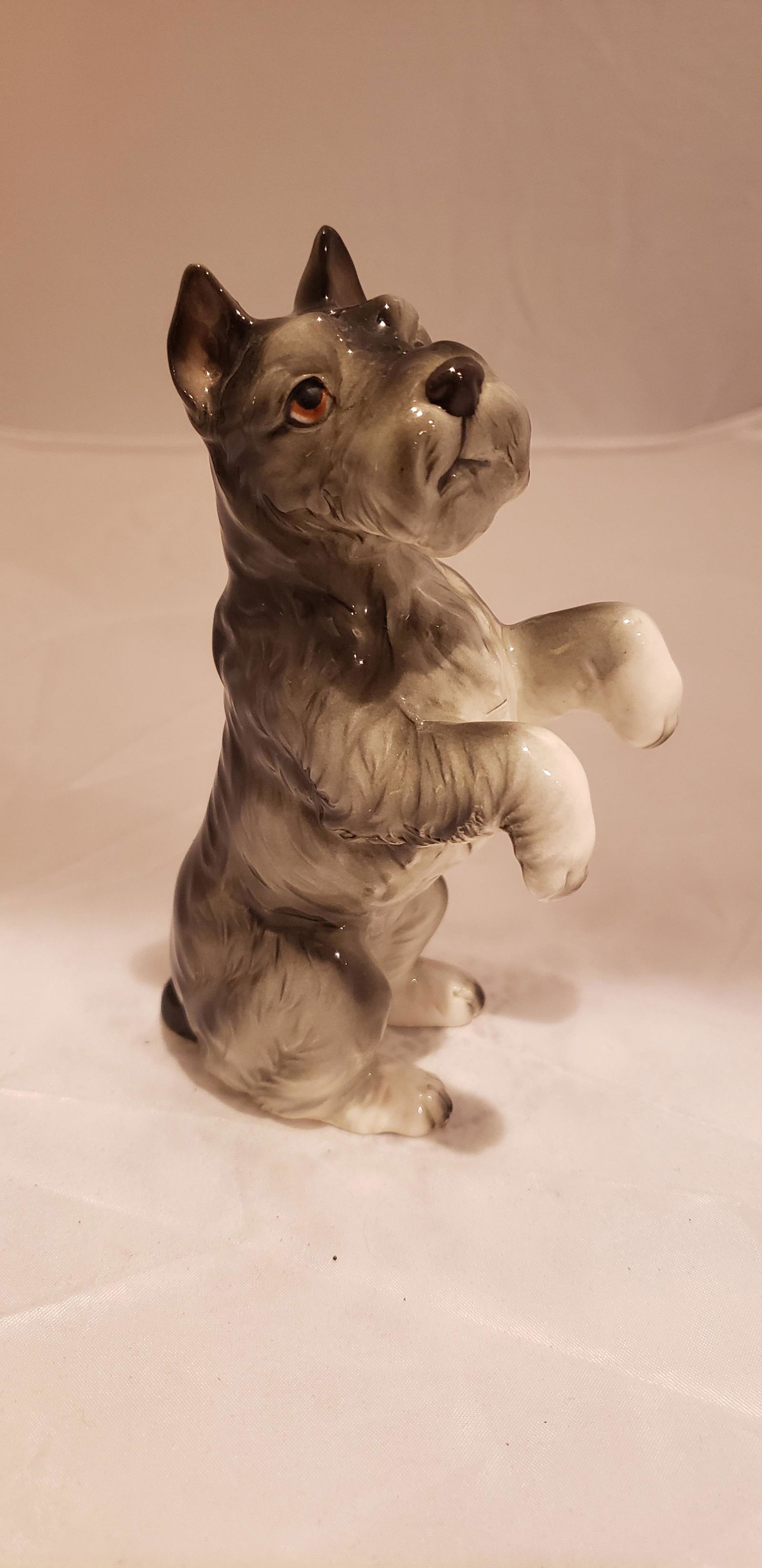 Vintage Japan Norcrest Dog Figurine with foil label: Vintage Japan Norcrest Dog Figurine with foil label. 5.5" tall. Buyers Premium 20% *In-House Shipping Available* After you pay your invoice for Hammer Price and Premium YOU WILL RECEIVE A 2nd INVOICE