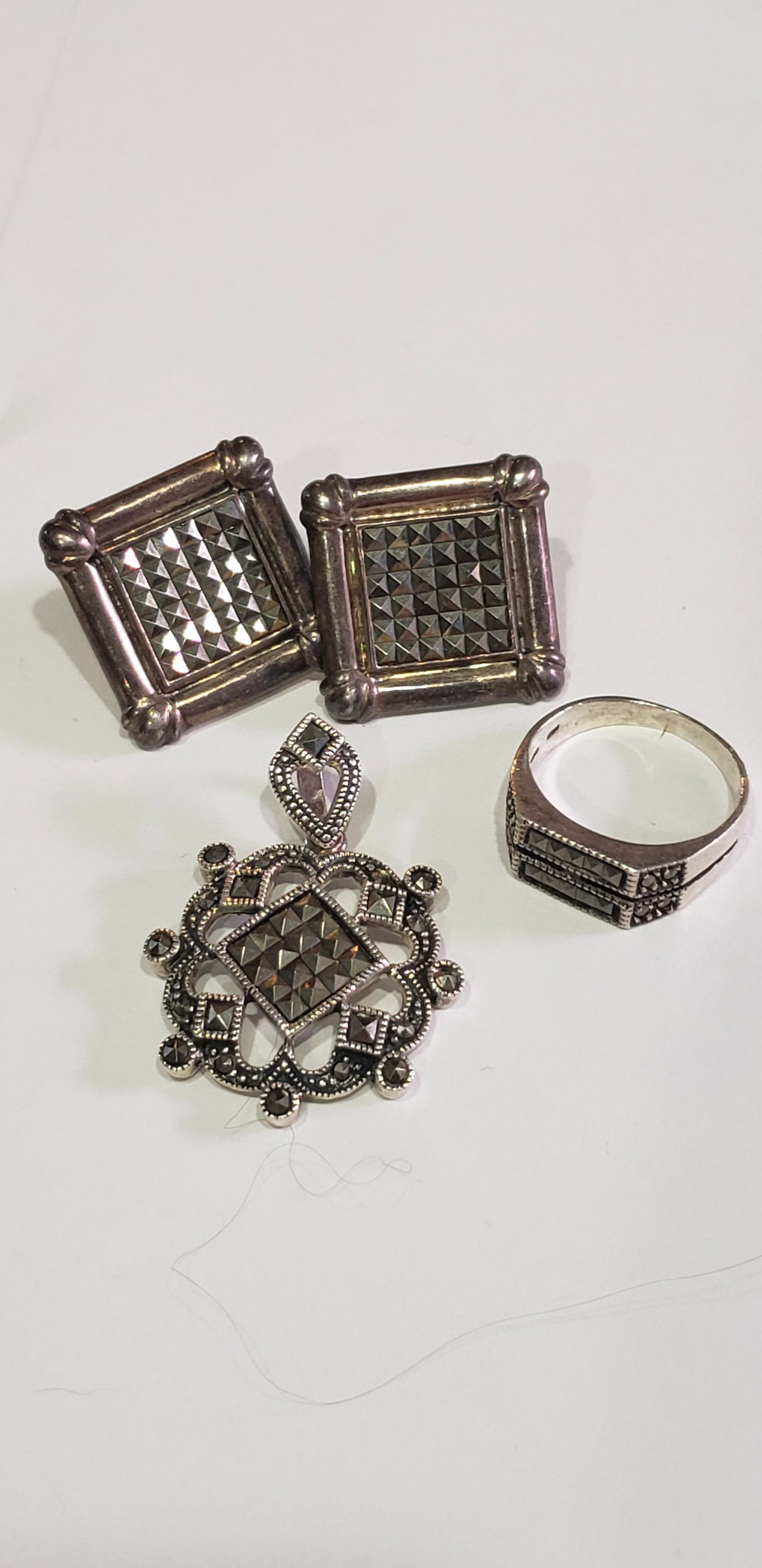Sterling Silver Marcasite Jewelry lot: Sterling Silver Marcasite Jewelry lot. Buyers Premium 20% *In-House Shipping Available* After you pay your invoice for Hammer Price and Premium YOU WILL RECEIVE A 2nd INVOICE THRU PAYPAL FOR SHIPPING