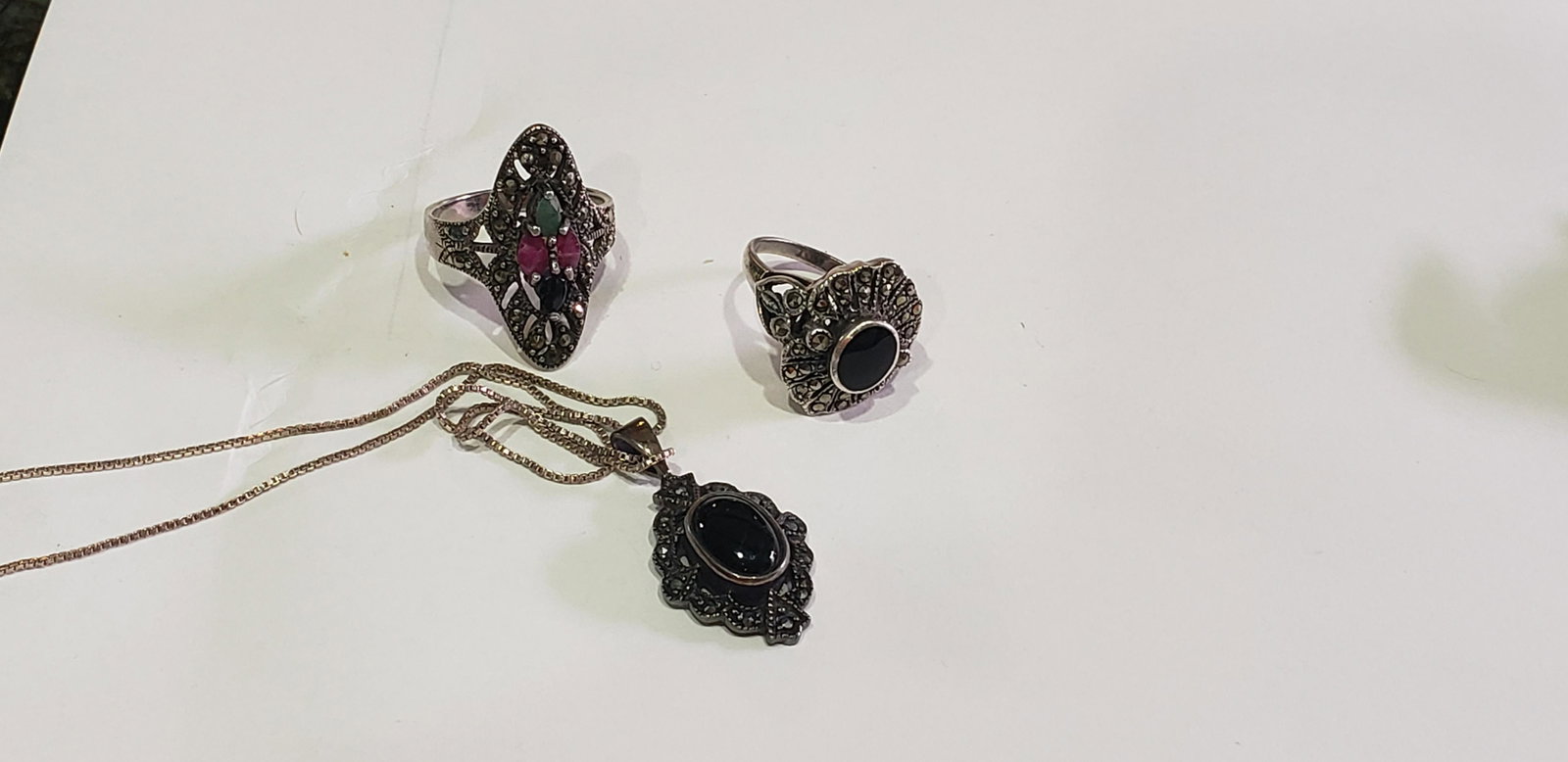 Sterling Silver Marcasite Onyx Jewelry lot: Sterling Silver Marcasite Onyx Jewelry lot. Buyers Premium 20% *In-House Shipping Available* After you pay your invoice for Hammer Price and Premium YOU WILL RECEIVE A 2nd INVOICE THRU PAYPAL FOR SHIP