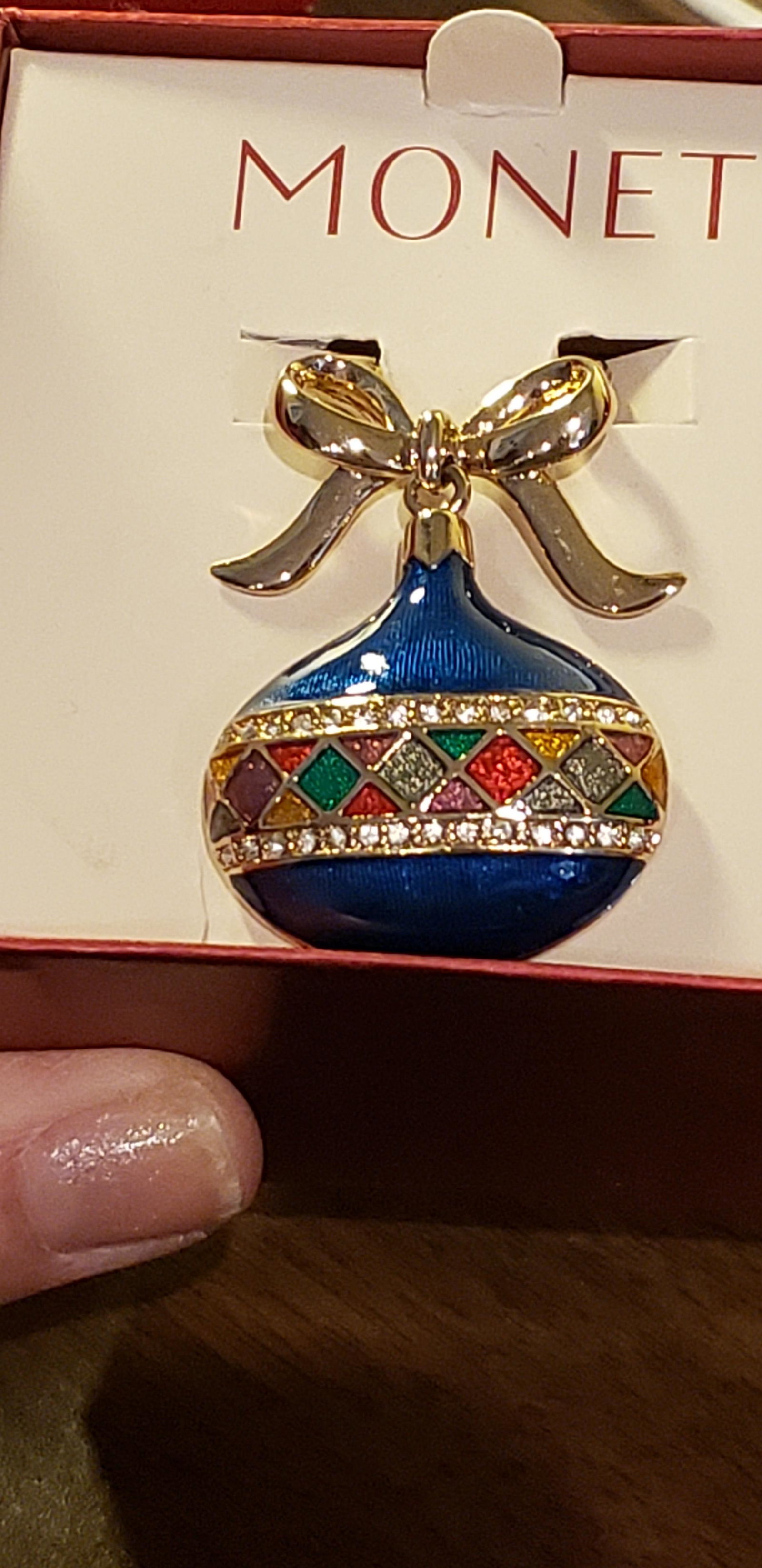 Enamel Christmas Ornament Monet Brooch: Enamel Christmas Ornament Monet Brooch. Comes in its original box.Buyers Premium 20% *In-House Shipping Available* After you pay your invoice for Hammer Price and Premium YOU WILL RECEIVE A 2nd INVOIC