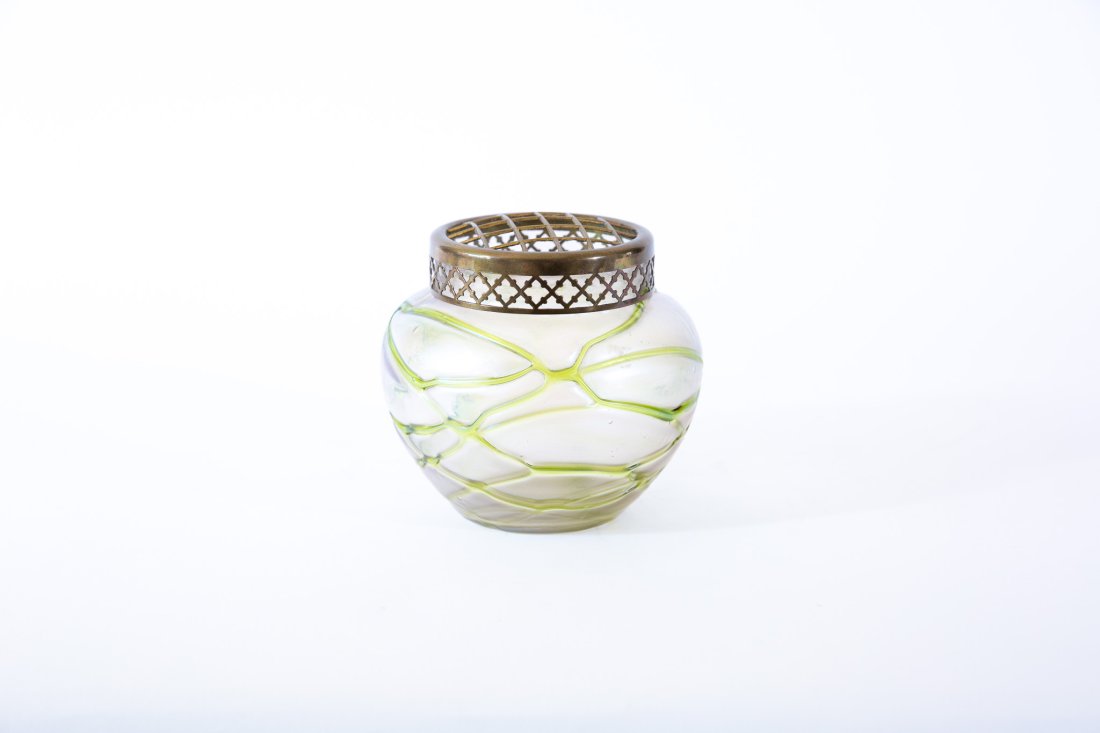 Loetz-Style Vase w/ Reticulated Brass Flower Top: A Loetz-style vase with reticulated brass flower top.Size: 4.5 inches high x 5 inches wide