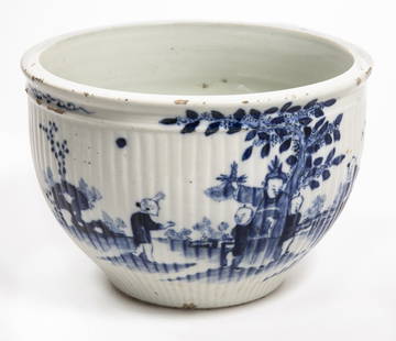 19th Century Korean Blue & White Bowl: A 19th century blue and white Korean bowl. The body of the bowl is hand painted with rich cobalt, depicting a family in a village. The underside reveals an original red wax seal. Measures 5.5H x 8.25W