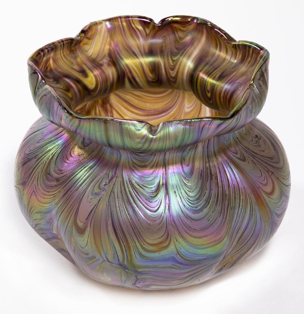Loetz Ruffled Rim Art Glass Vase: A Loetz ruffled rim vase with pinched body and polished pontil. Measures 5.25H x 6W