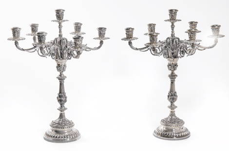 Pair of Grand Buccellati Rococo Sterling Silver Candelabra: Magnificent pair of Buccellati solid (not weighted) sterling silver Rococo-style candelabra, each having seven candle holders. Each measures 21H x 15W x 5.75D(at base). Total Weight: Approximately 261