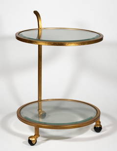 Gilt Metal & Glass Two-Tier Bar Cart: A gilt metal and beveled glass shelf two-tier bar cart on wheels. Measures 28H x 20W