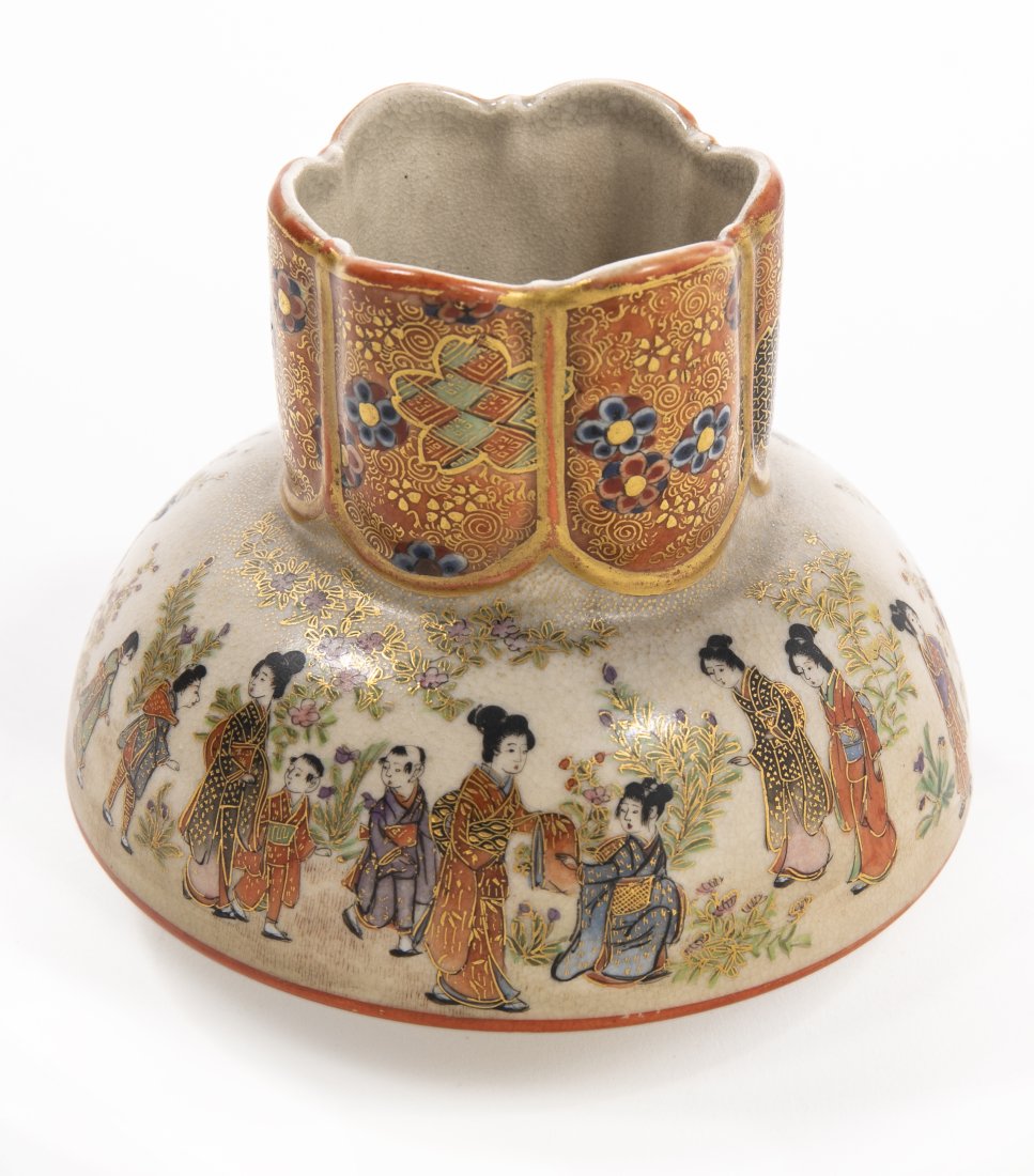 Unusual Form Japanese Satsuma Vessel Signed: An unusual form footed Japanese Satsuma vessel with hand painted scenes throughout the body. Signed at the bottom. Measures 3.5H x 4W x 4D