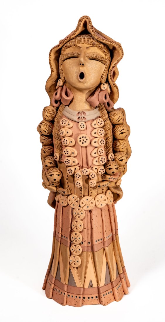 Oversized Clay Kachina by Cheyenne Jim (Diane Lynn): An oversized Kachina doll executed in clay by Cheyenne Jim (Diane Lynn). Size: 20H x 7W x 6D