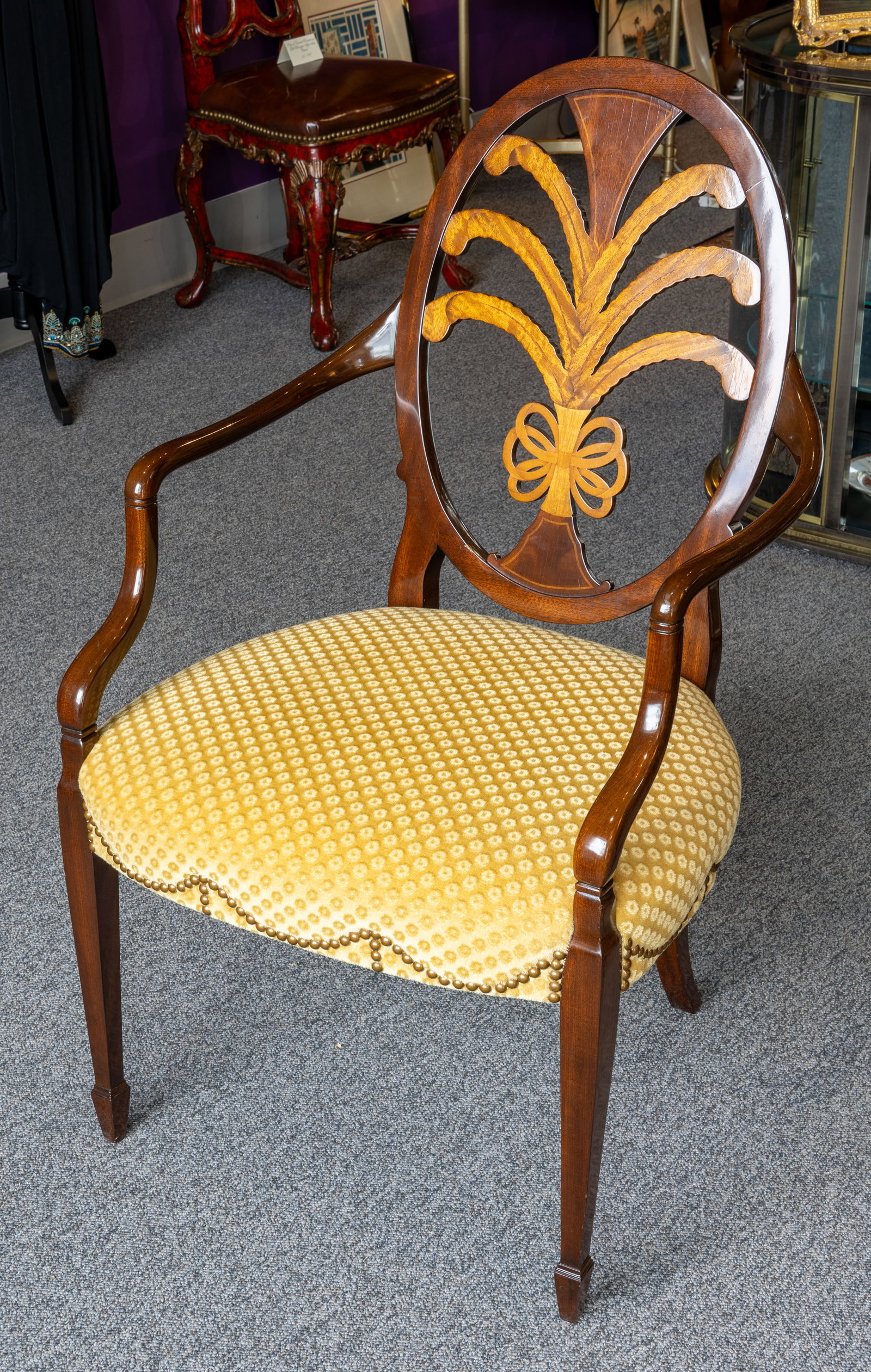 Karges Hepplewhite-Style Plume Carved Armchair: Karges Hepplewhite-style plume carved armchair. Size: 39H x 23W x 20D, Seat Height: 18H. Provenance: Rulle Collection