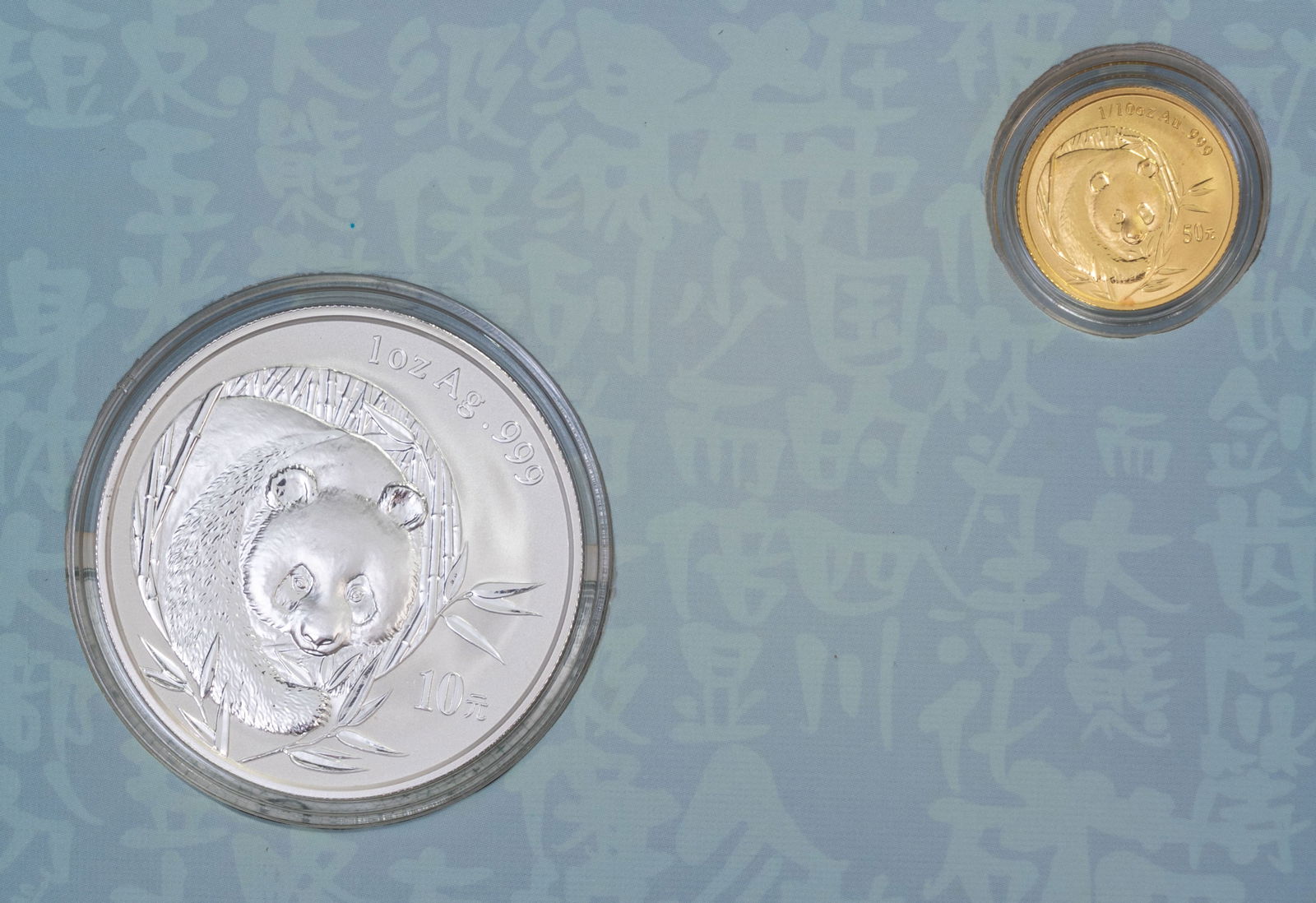 Chinese Silver and Gold Panda Set in Book (1 of 6)