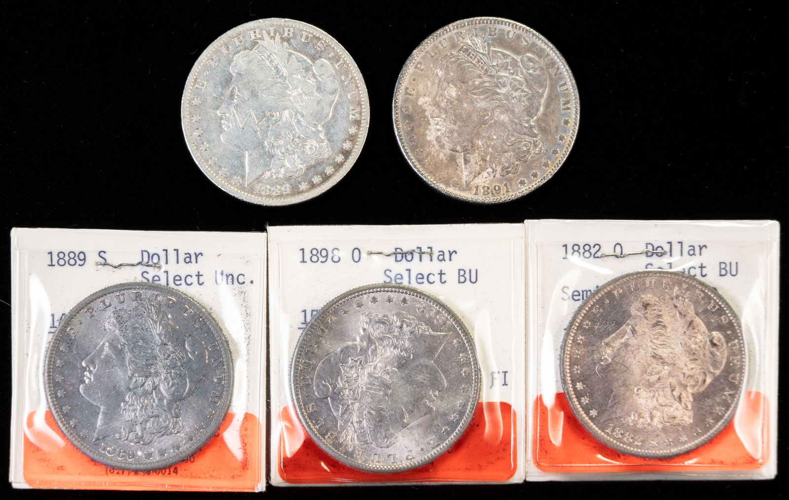 Five US Morgan Silver Dollars (1 of 2)