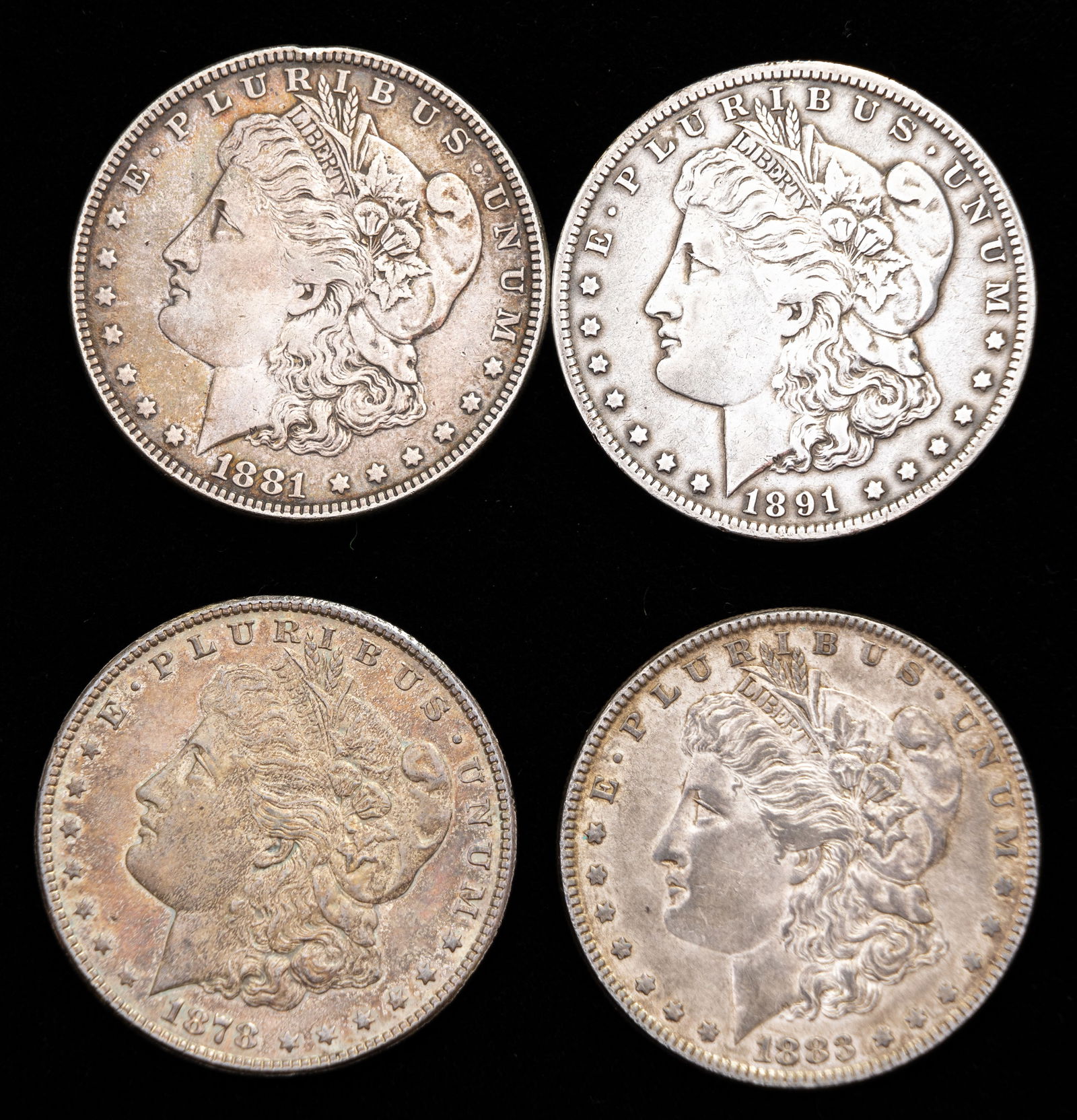 Four US Morgan Silver Dollars (1 of 2)