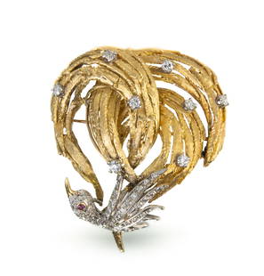 18k Gold Bird Brooch: 18k yellow and white gold brooch featuring a small bird set in diamonds with ruby eye and carved gold feathers with small pronged-set diamonds peppered throughout. Markings: 18k, ITALY. Total