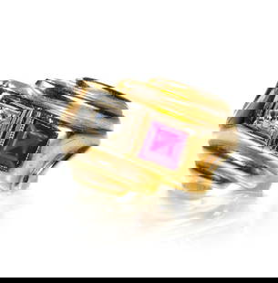 14k Ruby and Diamond Ring: 14k yellow gold ring with one bead set round brilliant cut diamond set in a square setting (estimated at 0.16 ct.) and one bezel set square cut ruby. Ring Size: 8.25. Markings: 14k. Total weight: