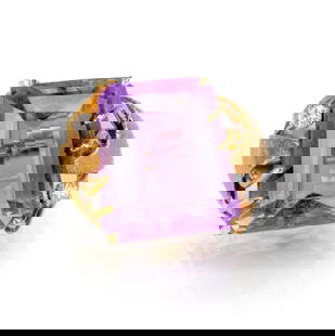 14k Gold Amethyst Ring: 14k yellow gold ring with a pronged-set trapezoid shaped amethyst center stone flanked by two round cut diamonds (one 0.5 ct. and one 0.7 ct.) with stylized brushed gold leaves on the shank. Ring