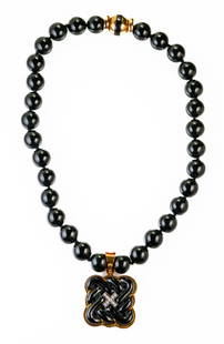 GUMPS 18k Yellow Gold and Black Jade Necklace: 18k yellow gold and black jade necklace with a removable pendant by Gump's. The necklace comes with the original box from Gump's Department Store in San Francisco, CA. Measurements: the beaded necklac
